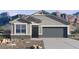 Beautiful single-story home with mountain views, low-maintenance landscaping, and neutral color scheme at 8516 W Clemente Way, Florence, AZ 85132