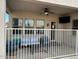 Back porch featuring a ceiling fan and seating at 8820 W Glenn Dr, Glendale, AZ 85305