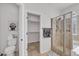 Bathroom with large shower, toilet, and tile flooring at 8820 W Glenn Dr, Glendale, AZ 85305