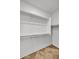 Walk-in closet with shelving and tile flooring at 8820 W Glenn Dr, Glendale, AZ 85305