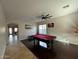 Game room includes a classic pool table and has an adjacent area to the front entrance at 8820 W Glenn Dr, Glendale, AZ 85305