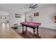 Spacious game room featuring a billiard table, accent lighting, and tile flooring at 8820 W Glenn Dr, Glendale, AZ 85305