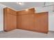 Garage with expansive storage cabinets for organization and easy access at 8820 W Glenn Dr, Glendale, AZ 85305