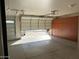 Spacious garage with epoxy floors and plenty of cabinet space at 8820 W Glenn Dr, Glendale, AZ 85305
