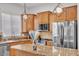 Modern kitchen with stainless steel appliances and granite countertops at 8820 W Glenn Dr, Glendale, AZ 85305