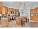 Modern kitchen featuring stainless steel appliances, granite countertops, and ample cabinet space at 8820 W Glenn Dr, Glendale, AZ 85305