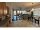 Open-concept space that connects the kitchen, dining, and living area for easy gatherings at 8820 W Glenn Dr, Glendale, AZ 85305