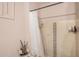 A full bathroom featuring a shower with tile surround and a shower curtain at 10480 W Martin Rd, Casa Grande, AZ 85194