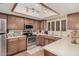 Efficient kitchen with stainless steel oven, microwave and lots of cabinet storage at 10480 W Martin Rd, Casa Grande, AZ 85194