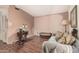 A cozy living room area with wood-look floors and comfortable seating at 10480 W Martin Rd, Casa Grande, AZ 85194