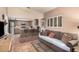 Living room featuring view into kitchen with counter seating and stainless appliances at 10480 W Martin Rd, Casa Grande, AZ 85194