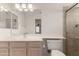Bright bathroom features a shower, vanity, and a large mirror at 11260 N 92Nd St # 2102, Scottsdale, AZ 85260