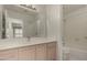 Bright bathroom features a double sink vanity and shower/tub combo at 11260 N 92Nd St # 2102, Scottsdale, AZ 85260