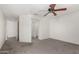 Spacious bedroom with a ceiling fan and two closets at 11260 N 92Nd St # 2102, Scottsdale, AZ 85260