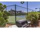 Exterior view of community tennis court and barbecue area at 11260 N 92Nd St # 2102, Scottsdale, AZ 85260