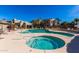 Inviting community pool and hot tub area, surrounded by lush greenery and comfortable lounge chairs for relaxation at 11260 N 92Nd St # 2102, Scottsdale, AZ 85260