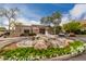 Community entrance with a water feature, landscaping, and building at 11260 N Scottsdale Rd at 11260 N 92Nd St # 2102, Scottsdale, AZ 85260