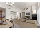 Staged living room features an open layout, modern furnishings, fireplace, and a bright, airy feel at 11260 N 92Nd St # 2102, Scottsdale, AZ 85260