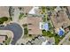 Overhead aerial view of a large home with an in-ground pool, patio and desert landscaping at 11439 E Bella Vista St, Scottsdale, AZ 85259