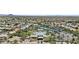 A beautiful aerial view of a community with a swimming pool, tennis courts, and clubhouse at 11439 E Bella Vista St, Scottsdale, AZ 85259