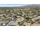 Extensive aerial view showing upscale neighborhood with desert landscaping and tile roofs at 11439 E Bella Vista St, Scottsdale, AZ 85259