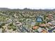 Community aerial view featuring pool, tennis courts, and desert landscaping at 11439 E Bella Vista St, Scottsdale, AZ 85259