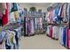 Walk-in closet with ample storage and organization at 11439 E Bella Vista St, Scottsdale, AZ 85259