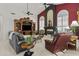 Stylish living area with a cozy fireplace, entertainment center, and comfortable seating arrangement at 11439 E Bella Vista St, Scottsdale, AZ 85259