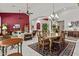 Open-concept living space with a dining table and comfortable seating area at 11439 E Bella Vista St, Scottsdale, AZ 85259