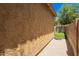 Side yard showing the gravel and grass area at 11959 W Pierce St, Avondale, AZ 85323