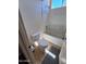 Bathroom featuring a tub shower combo, a toilet, and coordinating tile flooring at 11959 W Pierce St, Avondale, AZ 85323