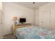 Bedroom with soft carpet, natural light, and storage, creating a relaxing and inviting atmosphere at 11959 W Pierce St, Avondale, AZ 85323