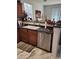 Kitchen showcasing ample cabinet space and a stainless steel dishwasher at 11959 W Pierce St, Avondale, AZ 85323
