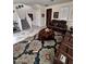 Cozy living room features a staircase, tile floors, and comfortable seating space at 11959 W Pierce St, Avondale, AZ 85323