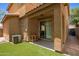 Covered patio with sliding glass door access to the backyard at 11959 W Pierce St, Avondale, AZ 85323