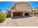 Exterior view of a home with garage access and balcony at 1234 N 84Th Pl, Scottsdale, AZ 85257