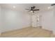 Large bedroom features modern ceiling fan, recessed lighting, and attached bathroom at 126 E Northern Ave, Phoenix, AZ 85020