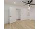 This bright bedroom features vinyl floors, white trim and two closets at 126 E Northern Ave, Phoenix, AZ 85020