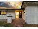 Inviting front entrance with charming brick pathway and stylish white brick accents at 126 E Northern Ave, Phoenix, AZ 85020