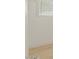 An indoor wall with baseboards and painted with white paint at 126 E Northern Ave, Phoenix, AZ 85020