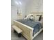 A cozy bedroom features stylish décor, comfortable bedding, and plenty of natural light at 13819 E Cavalry Dr, Scottsdale, AZ 85262