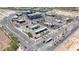 A lovely aerial view of the community, showing local stores and businesses for easy accessibility to shopping at 1384 S 222Nd Ln, Buckeye, AZ 85326
