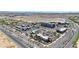 An impressive aerial shot showcases local shops and restaurants for easy access to everyday conveniences and amenities at 1384 S 222Nd Ln, Buckeye, AZ 85326