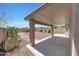 View of the back patio overlooking the gravel yard with decorative rock path at 1384 S 222Nd Ln, Buckeye, AZ 85326
