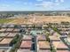 Aerial view of a community with a pool and construction in progress, offering stunning views at 1441 N 80Th Ln, Phoenix, AZ 85043