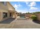 Backyard with fence and patio at 15046 W Post Dr, Surprise, AZ 85374