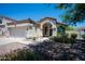 Charming single-Gathering home featuring a two-car garage and a well-maintained front yard at 20443 N 39Th Dr, Glendale, AZ 85308