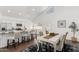 Eat-in kitchen featuring a dining table and bar seating at 2137 E New Bedford Dr, Gilbert, AZ 85234