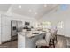Bright kitchen with stainless steel appliances, granite countertops, and a central island with seating at 2137 E New Bedford Dr, Gilbert, AZ 85234