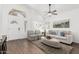 Bright living room featuring vaulted ceilings and stylish, comfortable furniture at 2137 E New Bedford Dr, Gilbert, AZ 85234
